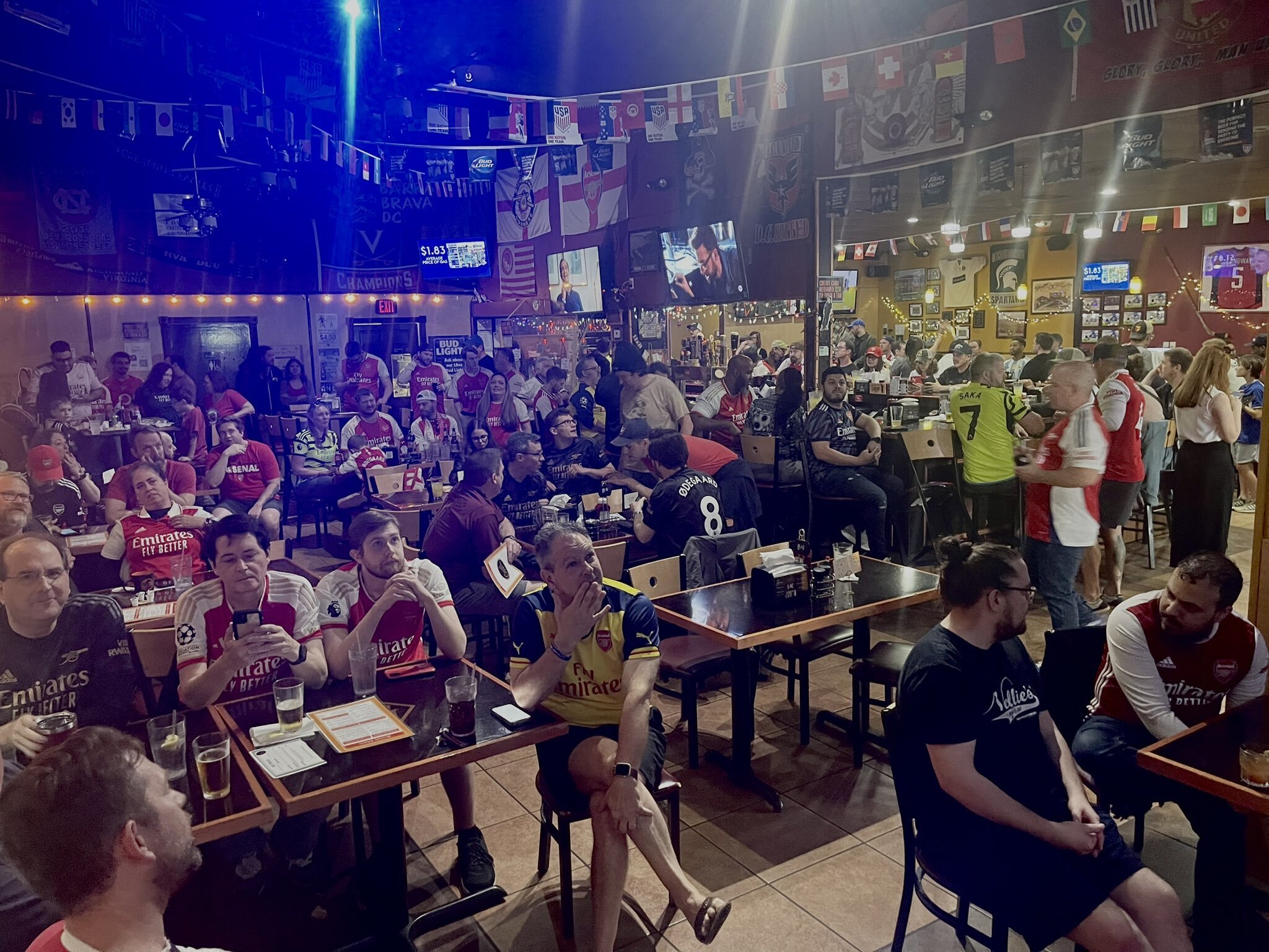 A packed crowd of Richmond Gooners watching a match inside Gus' Bar and Grill